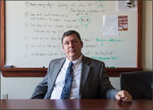 Jay Badams is the superintendent of the Erie public school system. In recent years, he has closed three schools and laid off 300 staff members because of budget constraints.
