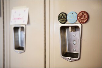 A student's locker is decorated with sobriety tokens, a reminder of the trauma and challenges some of the students are working to overcome during their stay.