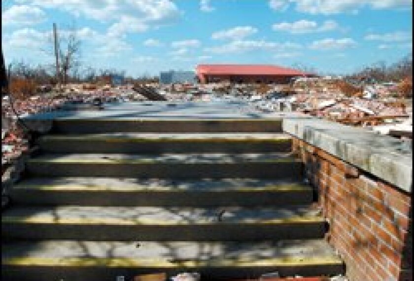 Only concrete steps remain at Pass Christian Middle School in Mississippi. Located a few blocks from the beach, the school was destroyed by Hurricane Katrina. Two other district schools were severely damaged.