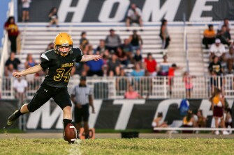 Julie Michael kicks during a game against the Hudson Middle School Cougars.