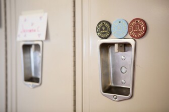 A student’s locker is decorated with sobriety tokens, a reminder of the trauma and challenges some of the students at the Wyoming Girls School have faced and are working to overcome during their stay at the school.