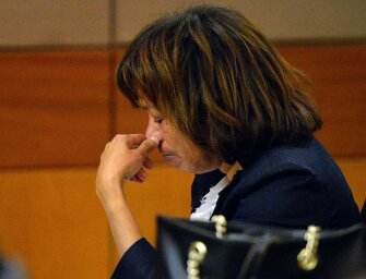Former Dunbar Elementary School teacher Pamela Cleveland listens to her mother, Rochelle Perrin, testify on her behalf as a character witness during sentencing hearings for the convicted school employees. Cleveland was one of 10 of the 11 defendants convicted of racketeering and other charges in the Atlanta school district test-cheating trial in Fulton County Superior Court.