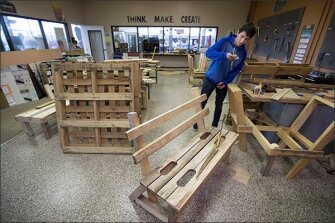 Johnny Rivera, a sophomore at iLEAD Academy photographs a bench. Rivera was in the process of 3D modeling the bench.