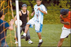 Oscar takes a shot during a Memorial Day pick-up soccer game. He hopes to become a Spanish teacher some day.