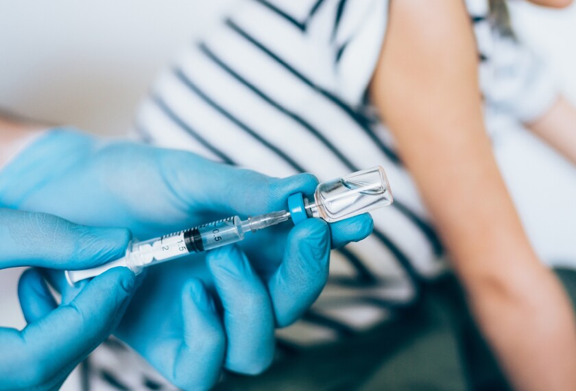 Image of child being vaccinated