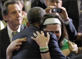 President Barack Obama hugs Newtown family members after speaking last week at the University of Hartford in Hartford, Conn., where he said lawmakers have an obligation to act on behalf of victims of gun violence.
