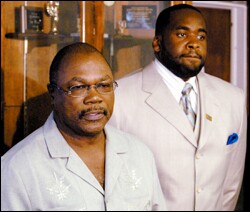 Wendell Anthony, left, a Detroit minister who will lead the school task force, appears last summer with Mayor Kwame Kilpatrick.