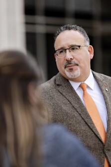 U.S. Secretary of Education Miguel Cardona speaks with the press after the education department's “Raise the Bar: Lead the World” event in Washington, D.C., on Jan. 24, 2023.