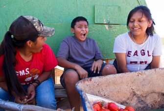STAR School 7th grader Leonardo Gonzalez reacts after tasting one of the hot peppers grown at the farm.