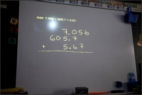 A math problem is displayed for Donna Young's students to solve.