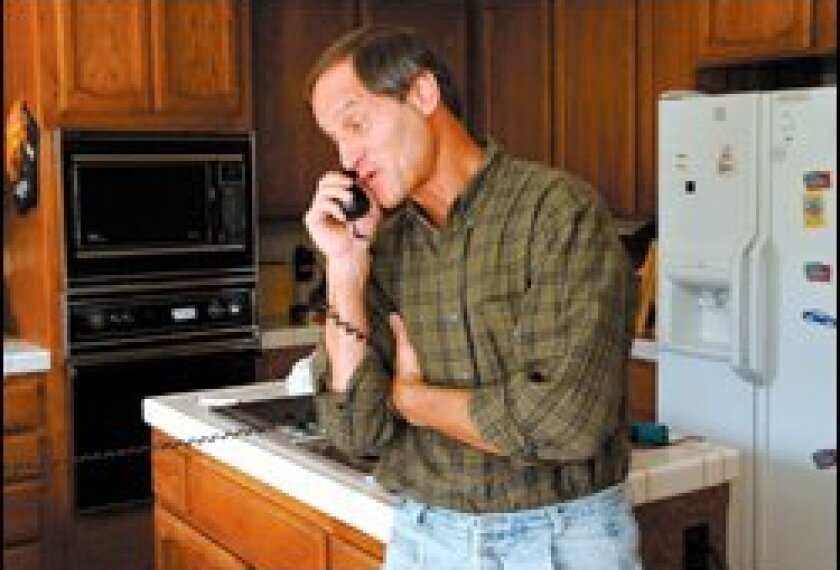 Michael A. Newdow talks on a radio show last June after the U.S. Supreme Court threw out his challenge to the Pledge of Allegiance in schools. He filed a new suit last week.