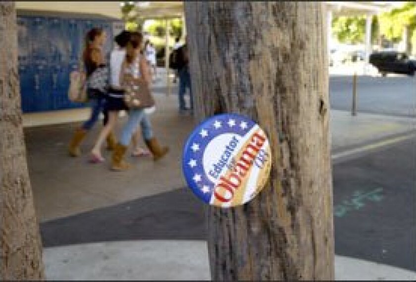 A Barack Obama button is pinned on a tree at Soquel (Calif.) High School late last month.