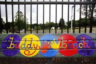 A playground bench is colorfully decorated at the new Sandy Hook Elementary School.