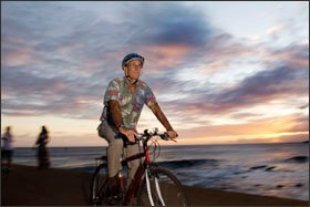 Randolph G. Moore, an assistant state superintendent, rides his bicycle, rain or shine, two miles to work every day in Honolulu. He encourages environmental awareness and conservation through a program that offers financial incentives to schools in the 178,000 student statewide system that reduce their energy use.