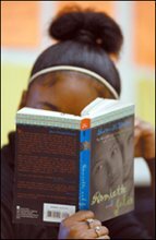 A 9th grade student spends part of the period reading a novel in Lori Pfeifer's English class at Iroquois High. The Ramp-Up program helps boost comprehension for middle and high school students who read two years or more below grade level.