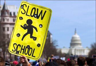 A protester displays a sign during the "March for Our Lives" rally on March 24, near the U.S. Capitol in Washington.