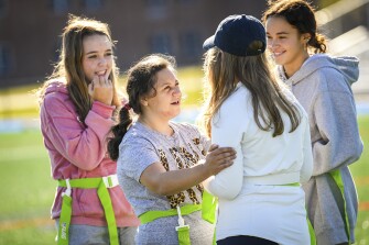 From left, Taylor Krogmann, Olivia Ebert, Viviana Nicastro and Grace D'Abate confer during a Unified Physical Education class at Saratoga Springs High School in Saratoga Springs, N.Y., Thursday, Nov. 3, 2022.