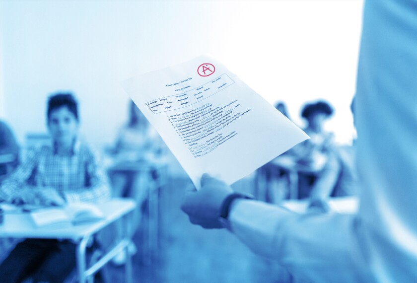 Conceptul image in blues of a teacher handing out graded papers.