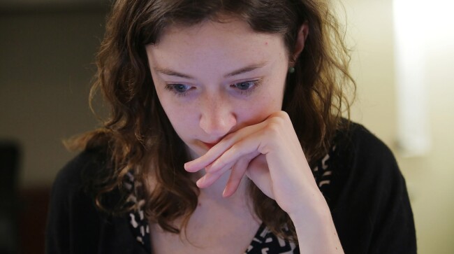 Reporter Madeline Will works on a story at the Education Week offices in Bethesda, Md.