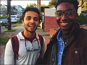 Andrew Brennen visits with Akbar Khan, a student at the University of California, Berkeley.