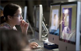 Sixth grader Christina Slattery works on a multimedia project about global warming in teacher Kelley Ward’s instructional technology class at Barr Middle School.