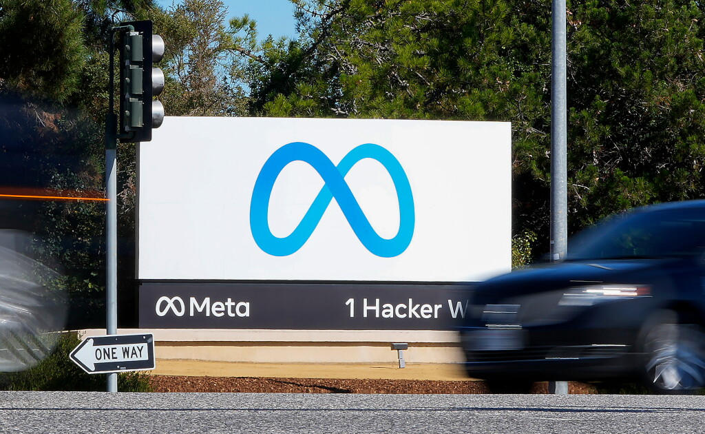 Photo: edweek.org A car passes Facebook's new Meta logo on a sign at the company headquarters on Oct. 28, 2021, in Menlo Park, Calif