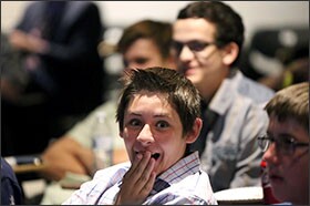 Ryan Knipple, a sophomore at Palo Verde High School in Las Vegas, reacts as Democratic nominee Hillary Clinton and her GOP rival Donald Trump face off at the debate.