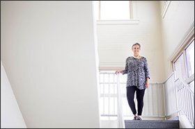 Judy Hennessey, the superintendent of two charter schools in Dayton, Ohio, stands inside the Dayton Early College Academy High School. She is among a group of charter leaders who want more stringent oversight of the charter sector, which is slated to get $71 million in federal funding over the next five years.