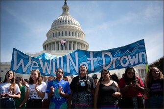 Organizers and activists urge action to stop climate change at the U.S. Capitol, part of the Fridays For Our Future campaign begun by teenage activist Greta Thunberg.