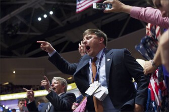 Delegates roar during convention speeches Tuesday night.