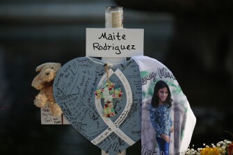 Maite Rodriguez's cross stands at a memorial site for the victims killed in this week's shooting at Robb Elementary School in Uvalde, Texas, Friday, May 27, 2022.
