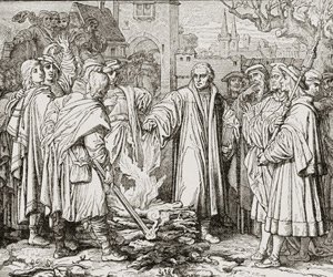A 19th century illustration shows Martin Luther, arguably the defining figure of the Protestant Reformation, burning documents issued by the Catholic pope.