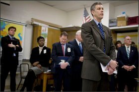 U.S. Secretary of Education Arne Duncan listens to students while visiting an Advanced Placement government class at Wakefield High School in Arlington, Va., on Feb. 10.