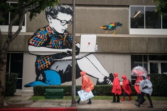 Thousands of teachers rallied through downtown Los Angeles to demand higher pay, more support staff, and smaller classes.