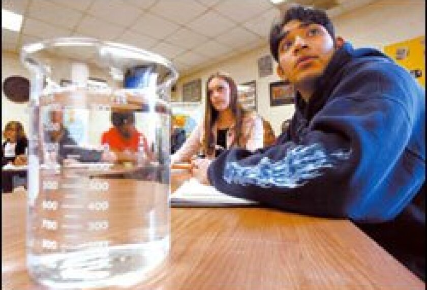 Students listen during psychology class at Canton High School in Michigan.