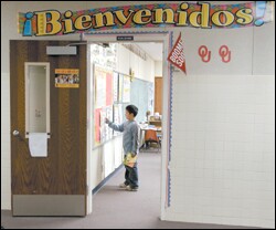 Student Carlos Vargas stands inside Ryan Schenk's classroom at Hennessey Elementary, Okla., on April 14.