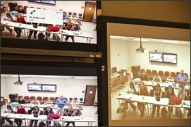 Students at Upperman High School in Baxter, Tenn., participate in a class in their distance-learning lab while students from other schools attend the class virtually.