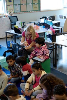 At Ruby Bridges Elementary School in Woodinville, Wash., special education students are fully a part of the general education classrooms. What that looks like in practice is students together in the same space but learning separately – some students are with the teacher, some with aides, and some are on their own with a tablet. Pictured here on April 2, 2024.