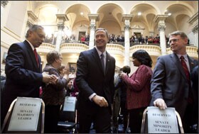 Members of the General Assembly applaud Maryland Gov. Martin O'Malley, as he enters the chamber to deliver his State of the State address in Annapolis.