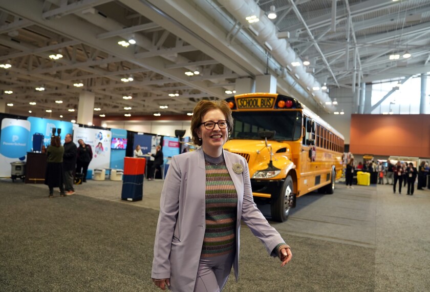 Superintendent Mary Catherine Reljac walks around the exhibition hall of the National Conference on Education in Nashville, on Feb. 12, 2026. Reljac is the superintendent for Fox Chapel Area School District in Pennsylvania.