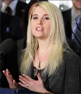 Erin Merryn, an activist and former victim of child sexual abuse, speaks at a news conference in Hoffman Estates, Ill., last year after Illinois Gov. Pat Quinn signed an “Erin’s Law” bill in that state. Persuaded by Ms. Merryn’s efforts, 26 states have considered or are considering similar bills in their 2013 or 2014 legislative sessions.