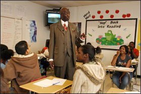 On his first day on the job as Clayton County’s “corrective superintendent,” John W. Thompson talks with students at Lovejoy High School. He faces the task of salvaging the school system’s accreditation by Sept. 1.