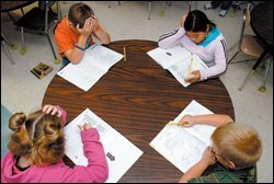 Third graders at Woodman Park Elementary School in Dover, N.H., take a state exam that was jointly developed by three New England states to satisfy federal requirements for testing in grades 3-8.