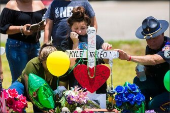 Mourners gathered at a memorial for Santa Fe High School freshman Aaron Kyle McLeod, who was killed during a shooting at the school in Santa Fe, Texas, on May 18, 2018.