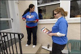 American Federation of Teachers members Jennifer Rodriguez, left, of Austin, Texas, and Peggy Wilcox of Anchorage, Alaska, canvas for Sen. Hillary Rodham Clinton’s presidential candidacy last week in Lansdowne, Pa.