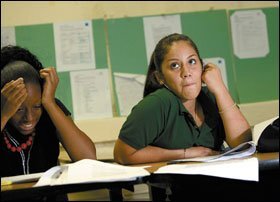 Miami Jackson High School 9th graders Jennifer Cruz and Keyerra Davis are among the students practicing skills in an on-grade-level reading class.