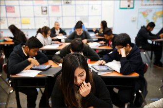 Student Krystal Lopez completes a class assignment about Freedom Riders in a U.S. history class at Alliance Collins.