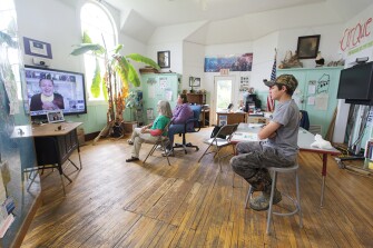 Connor and his teachers, Paula Greatorex and Lisa Turner, Skype with the other island schools during the last day of school in June, 2016. Skype gives the students an opportunity to socialize with other students outside their school.