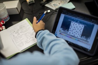 Freshmen Saanvi Suresh participates in a water experiment during Lauren DeNicola’s freshman biology class held at Scotch Plains-Fanwood High School in Scotch Plains, N.J., on March 10, 2022.