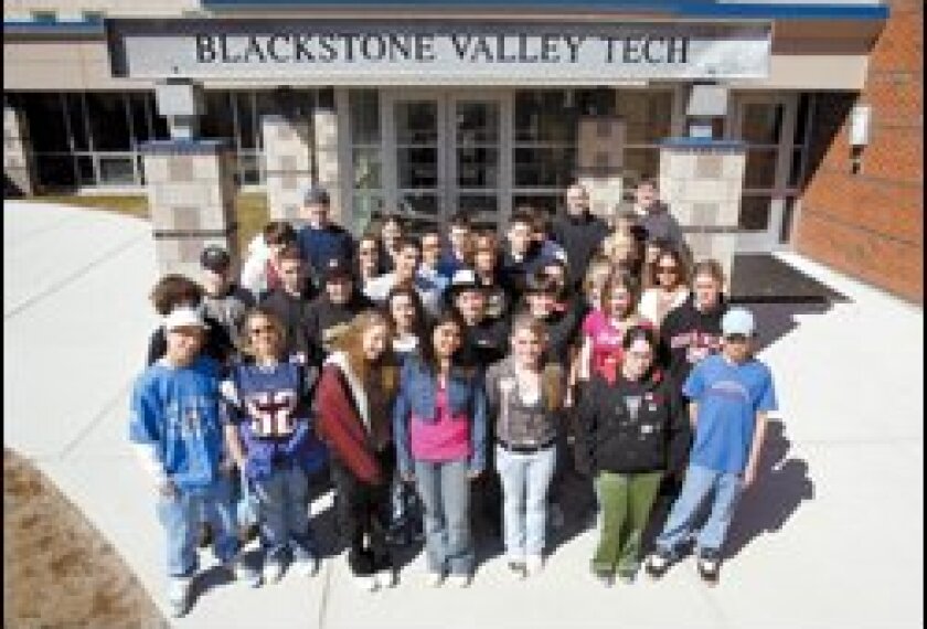 Students gather outside Blackstone Valley Regional Vocational Technical High School, which uses technology to put student data at the center of its improvement efforts.